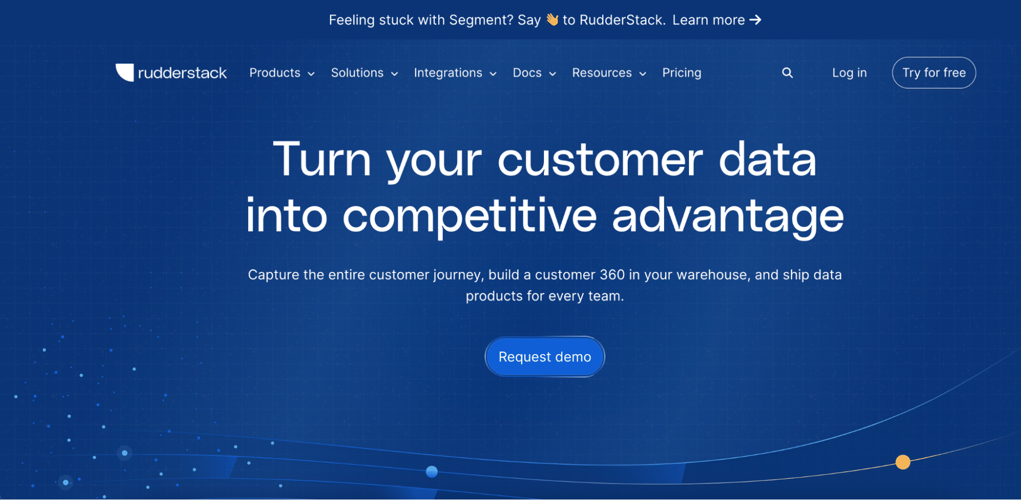 Rudderstack homepage showing event-driven ETL integration with Snowflake.